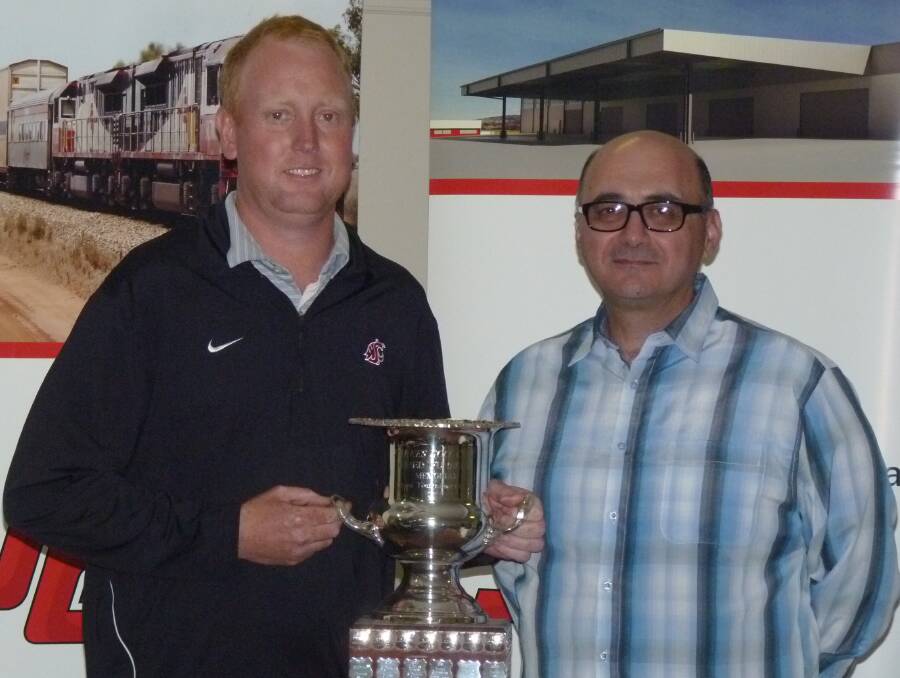 2017 WINNER: The 2017 Parkes Open champion was John Betland, who was presented the trophy by SCT Logistic's financial officer Bill Wakim at Parkes Golf Club.