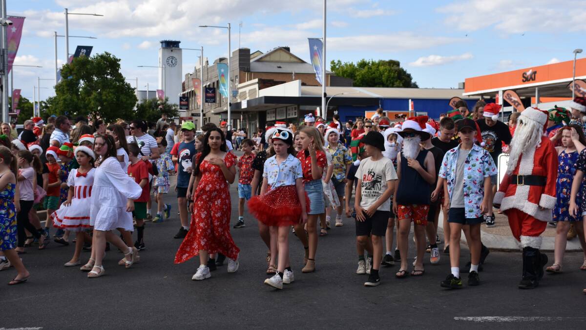 Last year's Christmas street parade saw hundreds of Parkes students, dressed in the festive spirit, involved. Photo supplied