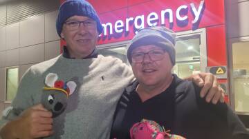 SPECIAL CAUSE: Geoff Rice of Parkes with Laurence Breen of Orange during the recent CEO Walk in My Shoes fundraising event for Ronald McDonald House Charities in Orange. Photo: SUPPLIED
