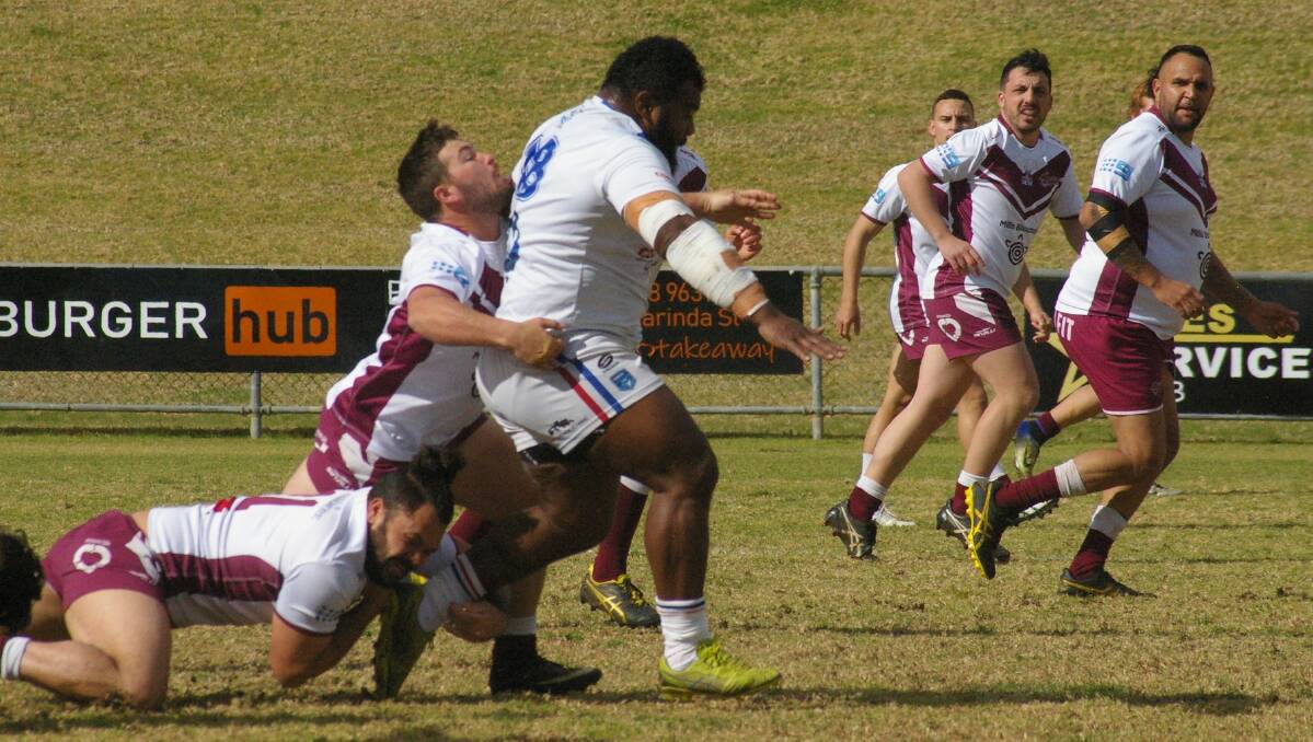 BARNSTORMING: Powerful Parkes prop Tikoko Noke scored a pair of tries and was near impossible to bring down in Parkes' win over Wellington. Photo: Parkes Spacemen Rugby League Facebook page
