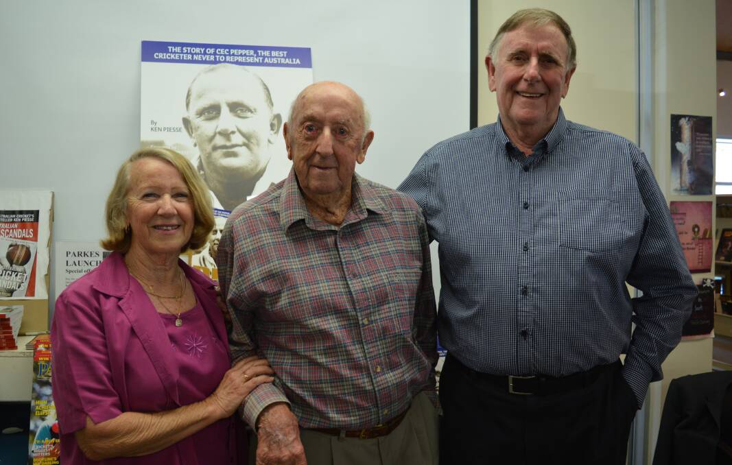 FAMILY: Jeanette Bond with her father and Cec Pepper's brother Keith Pepper, and Cec Pepper's son John Wither at the book launch of Cec Pepper's biography at the Parkes Shire Library in November 2018. Photo: Christine Little