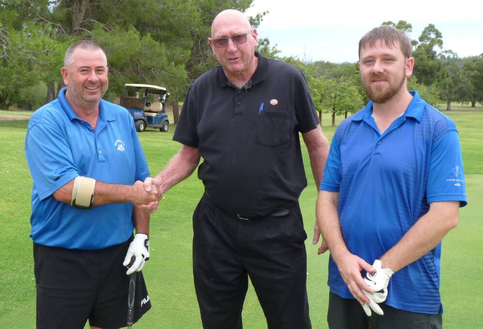AND THE WINNER IS: John Green took out this year's IGA Shootout, with sponsor Peter Boschman from Cunningham's IGA offering his congratulations and Joe Van Opynen named runner-up. Photo: Submitted