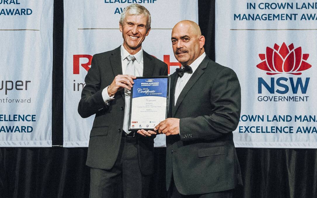 NOMINEE: Wally Biles (right) accepted the nominee award on behalf of Parkes Shire Food Service from Crown Lands Commissioner Richard Bush. Photo: Submitted