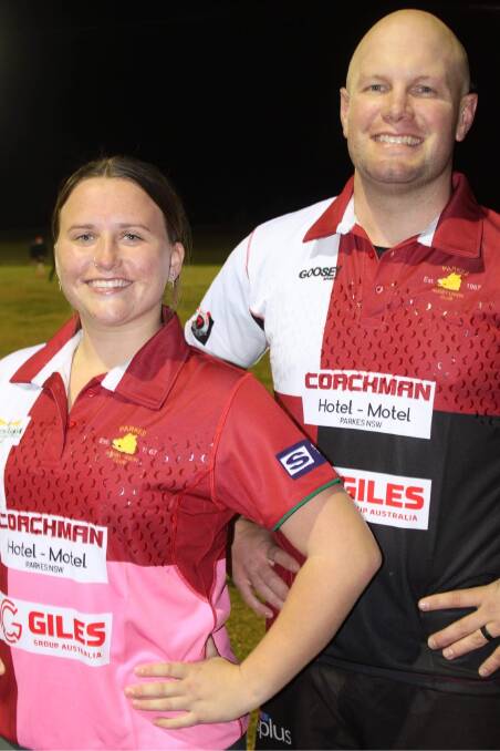 UP FOR GRABS: Lucy Turner and Ben Ryan showing off the new special jerseys the Parkes Boars will be auctioning off in July. Photo: SOPHIE WHITE