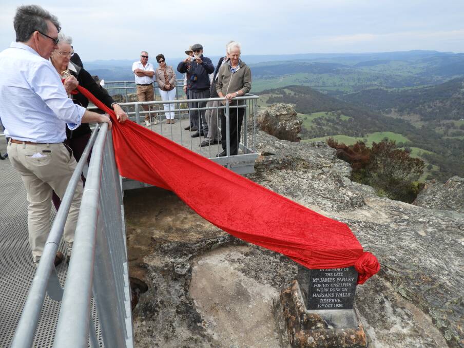 UNVEILED: Former Peak Hill woman Jean Crook, representing the Padley family, had the honour of unveiling the restored monument during the re-dedication of the Padley Memorial at Hassans Walls Lookout, south of Lithgow, on October 20. Photo: Supplied