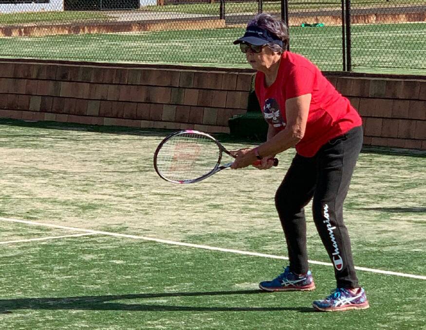FOCUSED: Beth Thomas, looking in the zone here, takes part in the Rally4Ever program at the Parkes Tennis Club. Photo: SUBMITTED