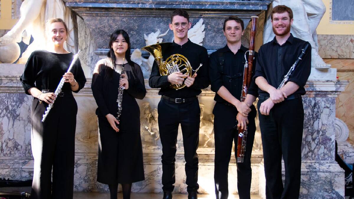 THE BIG BUSK: Well known Parkes musician Gordon Richter (right) will be making an appearance in the Sydney Youth Orchestras' The Big Busk on October 10. He's pictured here during the SYO's International Tour in April, outside Blenheim Palace in England with (from left) Isabeau Hansen (flute), Florence Chou (oboe), Simon Jones (French horn) and Josh Reynolds (bassoon). Photo: SYO