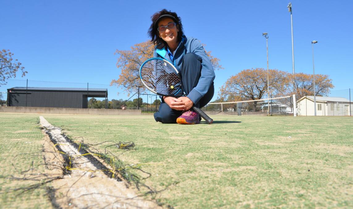 UPGRADES NEEDED: Six tennis courts that are in desperate need of upgrading are among the 14 projects shortlisted for some government funding and tennis coach Helen Magill is thrilled. Photo: Christine Little