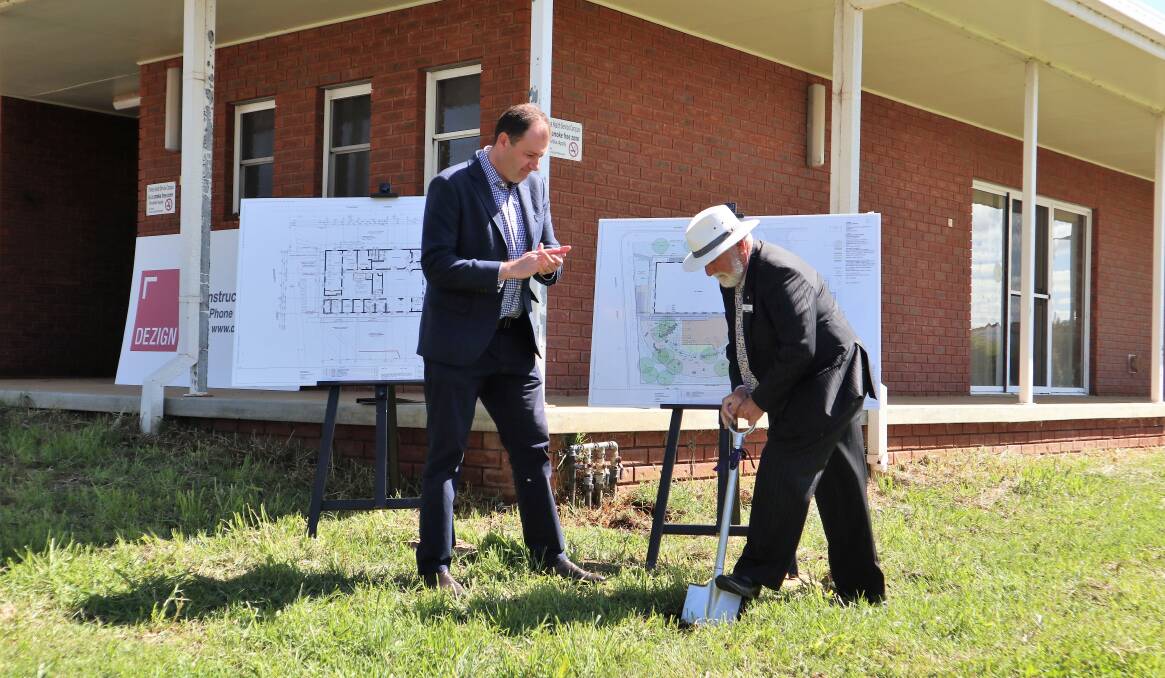 FIRST SOD TURN: Nationals MP Sam Farraway and Parkes Mayor Ken Keith OAM turn the first sod on the construction site in Coleman Street. Photo: Submitted