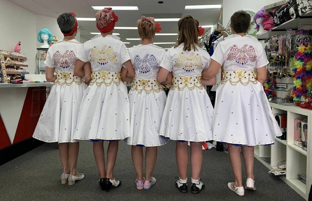 The Colouby Creations team always dress to impress each year for the Parkes Elvis Festival, here in their handmade white Elvis jumpsuit style dresses with specially designed belts from the UK. Picture supplied