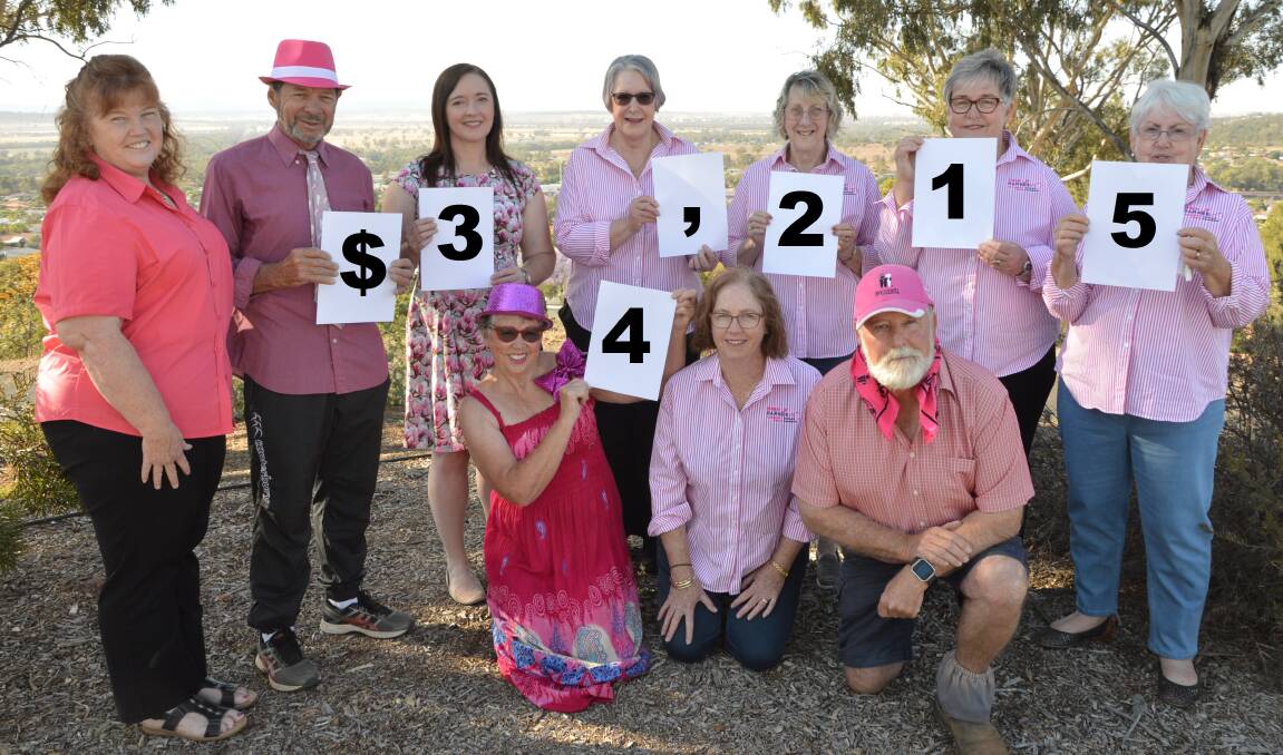 THRILLED: The Pink Up Parkes committee, back, Dianne Green, Bill Thomas, Marg Applebee, Jenny Breaden, Ruth Taylor, chair Carolyn Rice OAM and Lorraine Parker; front, Beth Thomas, Virginia Rice and Cr Ken Keith OAM, were thrilled with the final fundraising tally. Photo: Christine Little