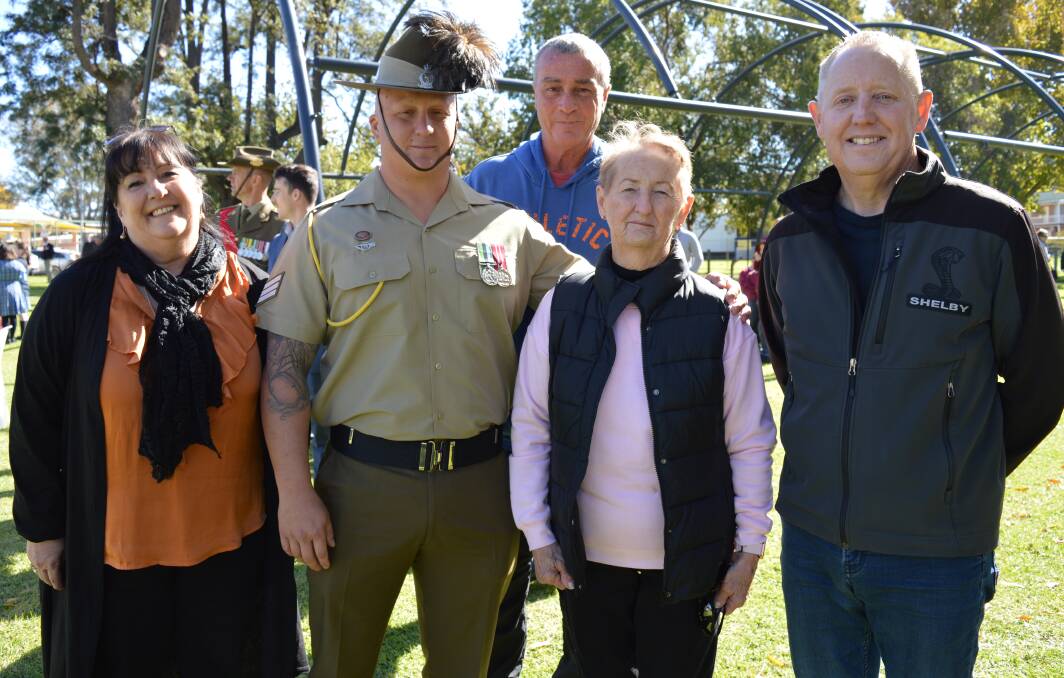 HOME SWEET HOME: Sergeant Craig Cole with his mum Tania Cole, dad Graham Cole, nanna Jannette Powter and uncle Dusty Powter at the end of the commemorative service in Cooke Park. Photo: Christine Little