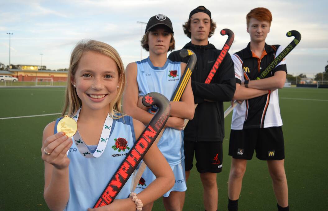 EMERGING TALENT: Meg Searl with her Australian gold medal, Nick Job, Koby Johnstone and Jack Westcott. Photo: Christine Little