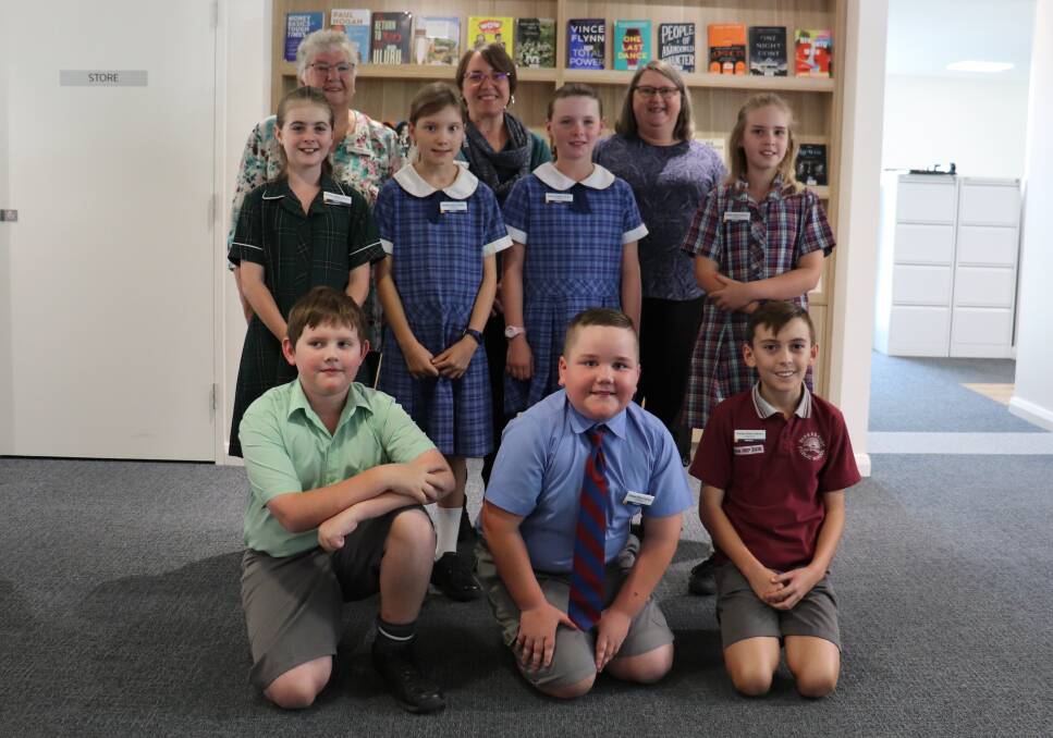 NEW LEADERS: Back, Cr Pat Smith and Parkes Library staff Emma Brown and Debbie Gould congratulate the new ambassadors - middle, Molly Clohessy, Evelyn Greef, Anna Orr and Grace McGirr; front, Knox Lamont, Toby Fliedner and John-Tian Waters. Photo: Submitted