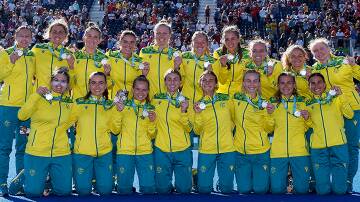 SILVER LINING: Parkes' Mariah Williams (fourth from the right) has claimed a silver medal, alongside her Hockeyroo teammates, at her first Commonwealth Games. Photo: Commonwealth Games Australia