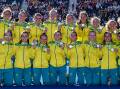 SILVER LINING: Parkes' Mariah Williams (fourth from the left) has claimed a silver medal, alongside her Hockeyroo teammates, at her first Commonwealth Games. Photo: Commonwealth Games Australia