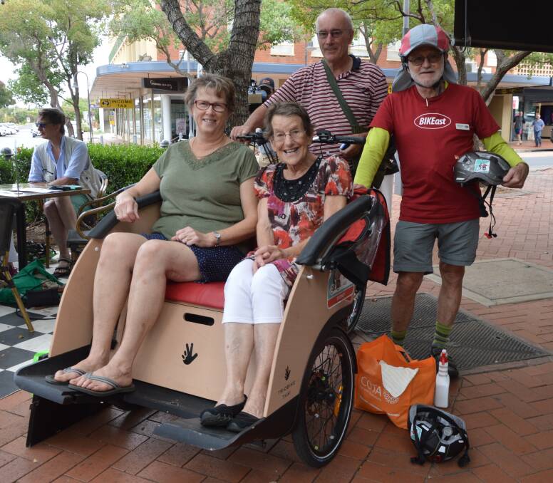 VISITOR: Cycling Without Age Parkes volunteers Jo Burke, Barb Guppy and Peter Guppy, with Adrian Boss from BIKEast, when a trishaw was in town on April 9. Photo: Christine Little