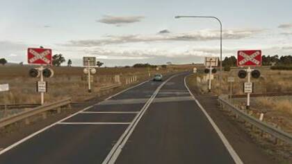 UPGRADES: The Tichborne level crossing at the S bend on the Newell Highway between Parkes and Forbes is receiving upgrades to its flashing lights and boom gates installed. Photo: Google Maps