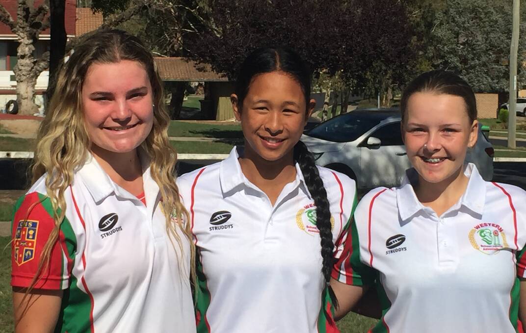 PARKES PRIDE: Abigail Simpson, Marites Woods and Maddison Spence proudly represented Parkes High School this week at the NSW CHS Girls Cricket Championship meeting at Bathurst. Photo: Joanne Simpson