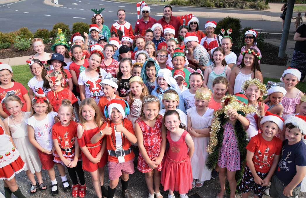 2018: Holy Family Primary School students dressed in their finest Christmas outfits ahead of last year's parade. Photo: Jenny Kingham