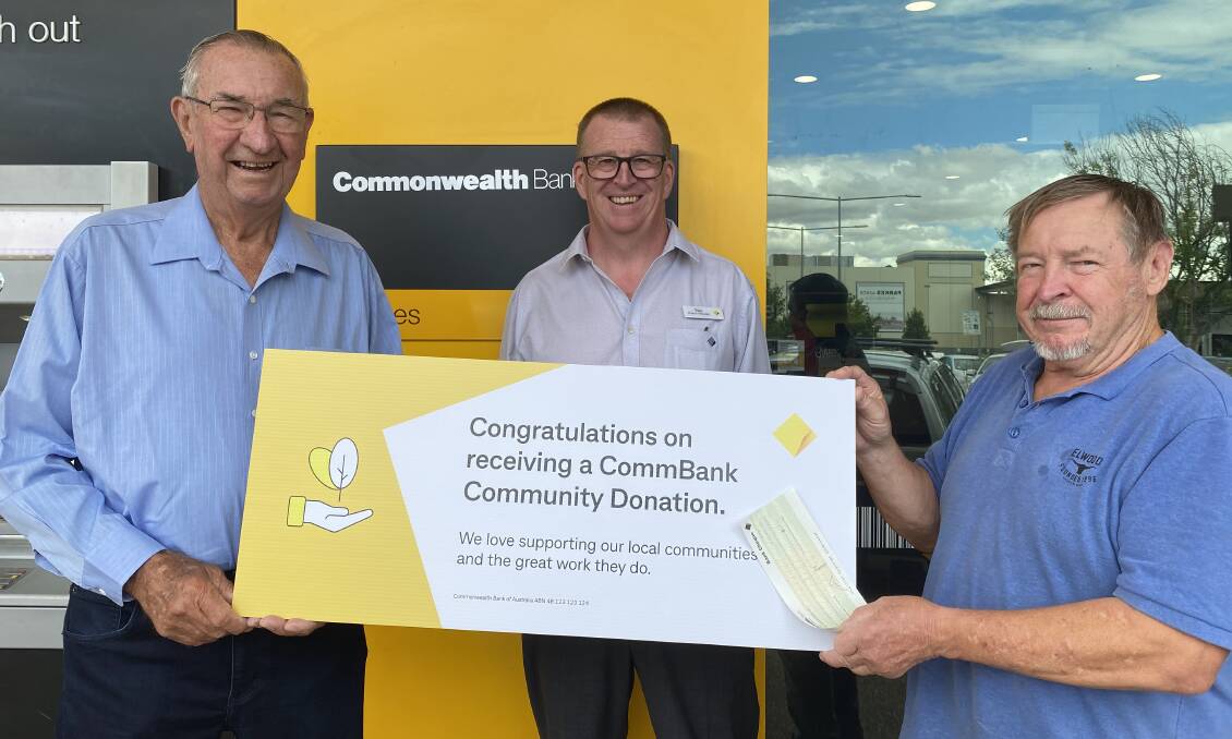 DONATION: Commonwealth Bank Parkes branch manager Troy Peters (centre) presented a cheque for $500 to Hedley Nicholson (left) and George Pratt from the Parkes Men's Shed. Photo: Submitted