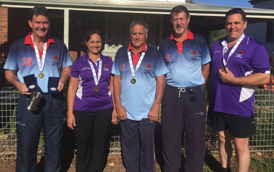 GOLDEN HAUL: Parkes masters hockey representatives Barry Reeves, Sharon Dixon, Warwick Johnson, Noel Johnson and Tony Mrak were thrilled with NSW's success at this year's Men's Masters Australian Hockey Championships. Absent -  Laurie Wakefield. Photo: Submitted