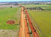 PROGRESS: The Brolgan Road alignment facing west is under construction, along with utilities for the Parkes Special Activation Precinct. Photo: Regional Growth NSW Development Corporation