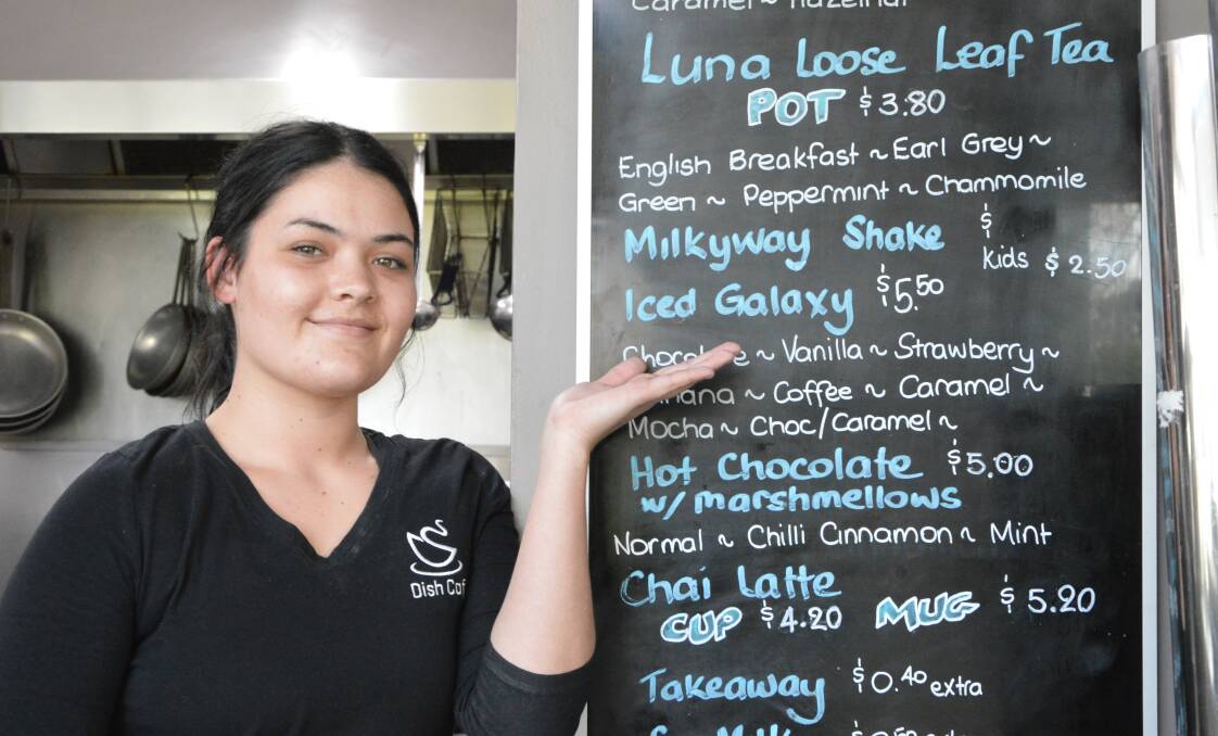 SPACEY: Dish Cafe employee Willow Mitchell-Hoey shows what's on the menu at their cafe at the Parkes Radio Telescope.