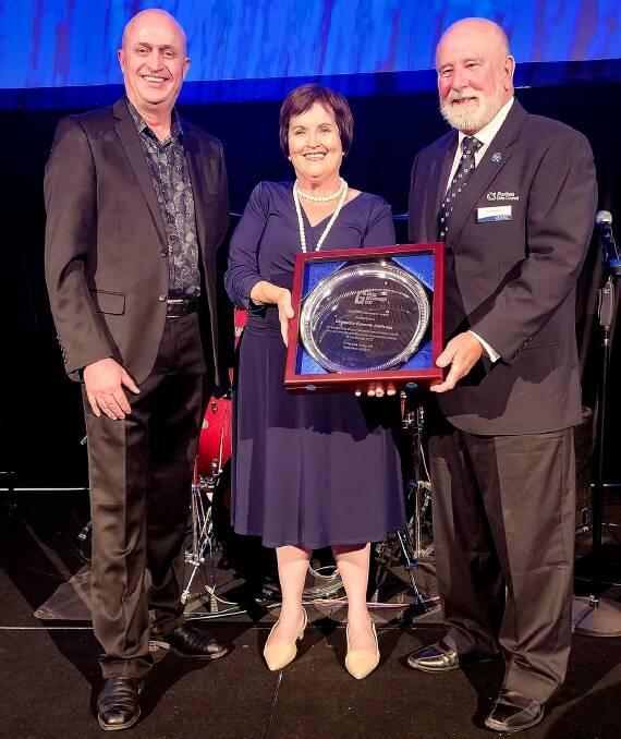 General Manager of Tweed Shire Troy Green and president of Local Government NSW Darriea Turleya presented a Local Government NSW Lifetime Achievement Award to Parkes former mayor Ken Keith OAM for 40 years' service. Photo by Bill Jayet