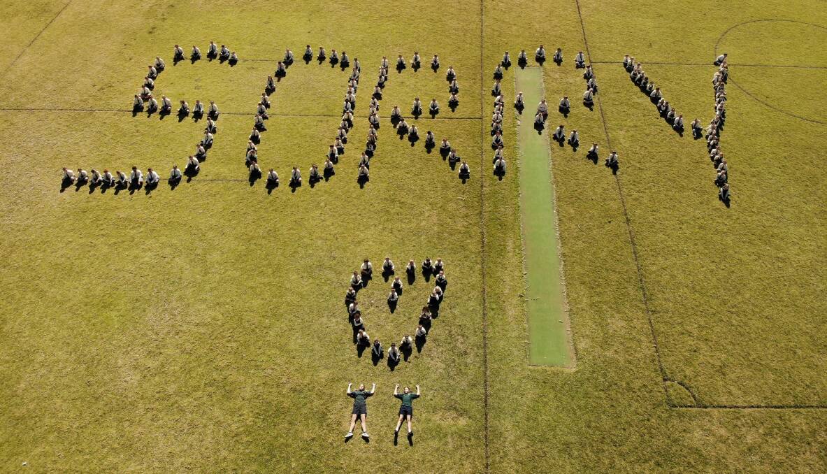 ACKNOWLEDGEMENT: Holy Family Primary School students formed the word SORRY on Wednesday for National Sorry Day. Photo: Submitted
