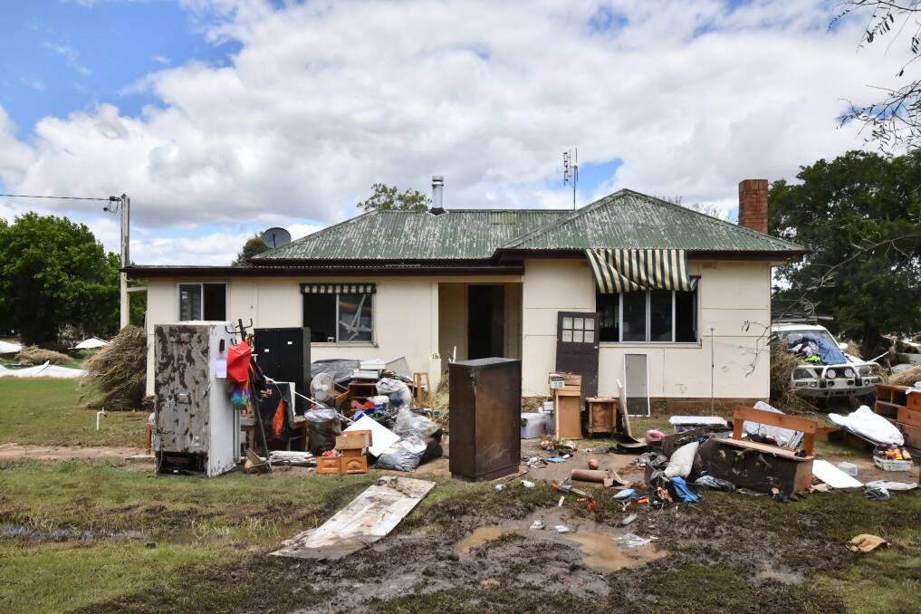 Many homes are currently unliveable but cannot be touched due to ongoing claims. Picture by Carla Freedman