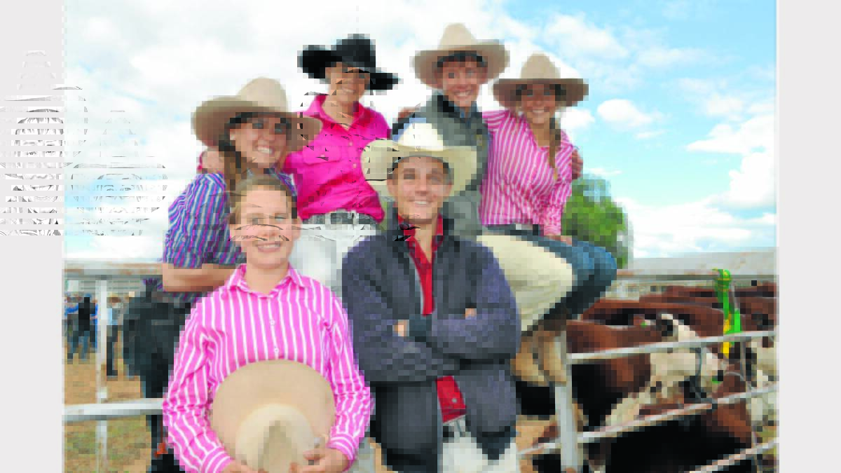 These Peak Hill and Narromine friends caught up at the Cattle Judging. On the fence – Sally Wright, Alisha Roots, Brad Fazzari, and Molly Wright; standing Becky Wright and Nathan Leach. 