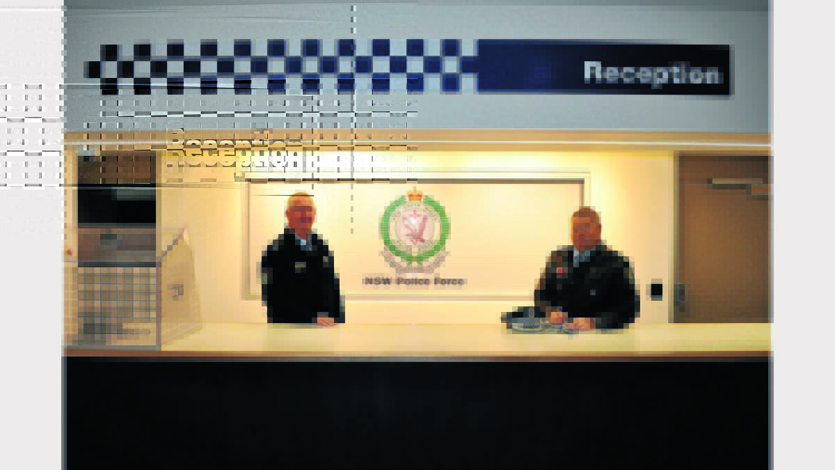 Superintendent Chris Taylor and Inspector Dave Cooper in the public reception/foyer area. 
