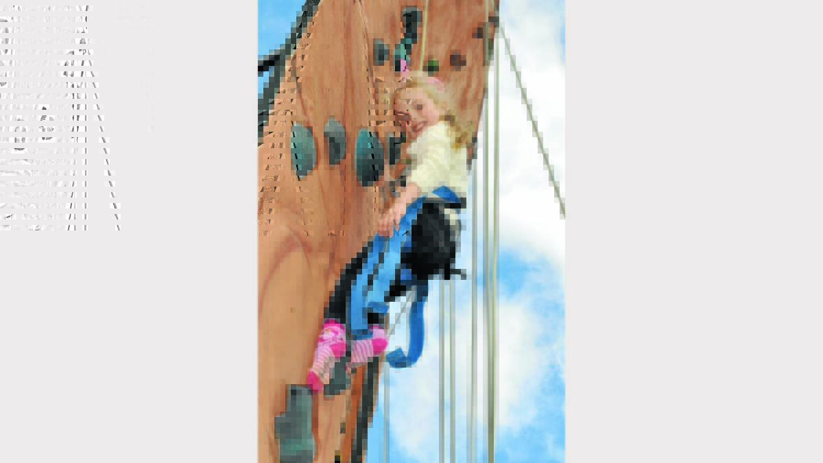 Ellie Parker was very brave as she climbed way up high on the climbing wall.