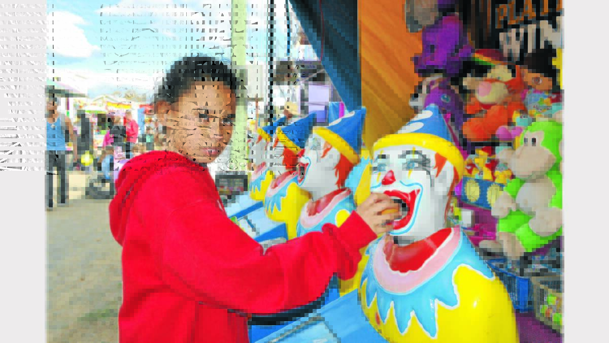 Kerryanne Watson tried her luck on the clowns in Sideshow Alley.