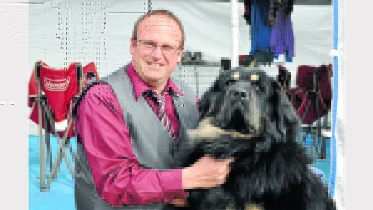 Neil Ford and his 14-month-old Tibetan Mastiff, Thunder, scored runner up in the utility group. 
